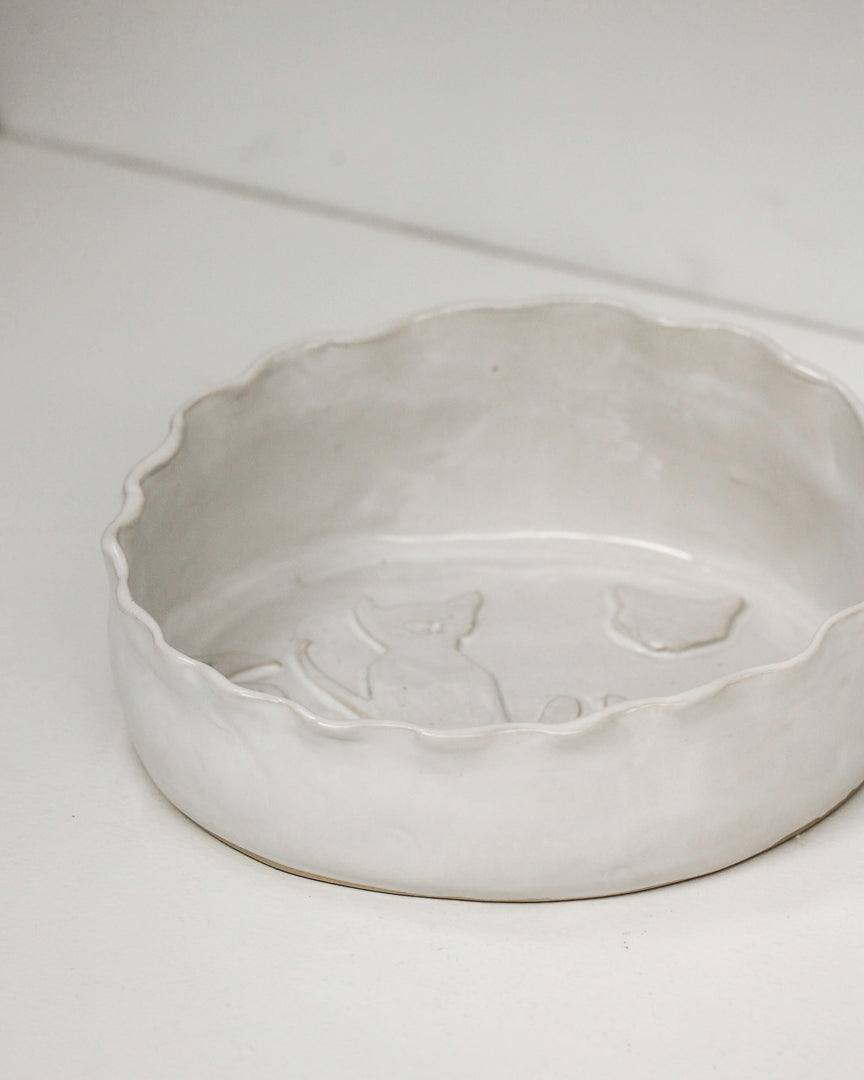 Pottery workshop in Palmerston North creating a handmade pet bowl at Mabel Vickers